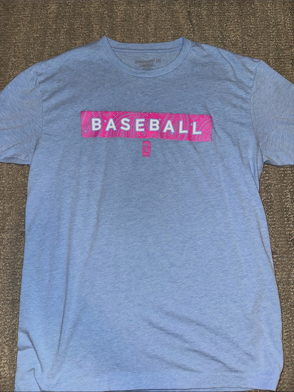 Baseball Lifestyle Light Blue Short-Sleeve Baseball Graphic Tee with Pink Accent